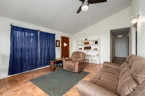 a bedroom with a bed and a cabinets