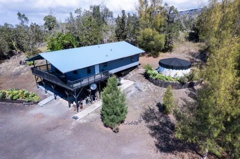 a view of a backyard with a tub