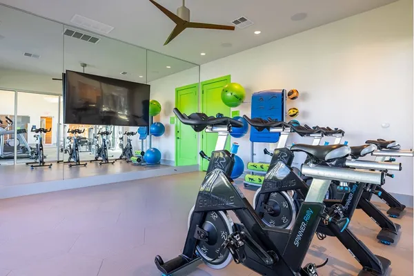 a view of a room with gym equipment