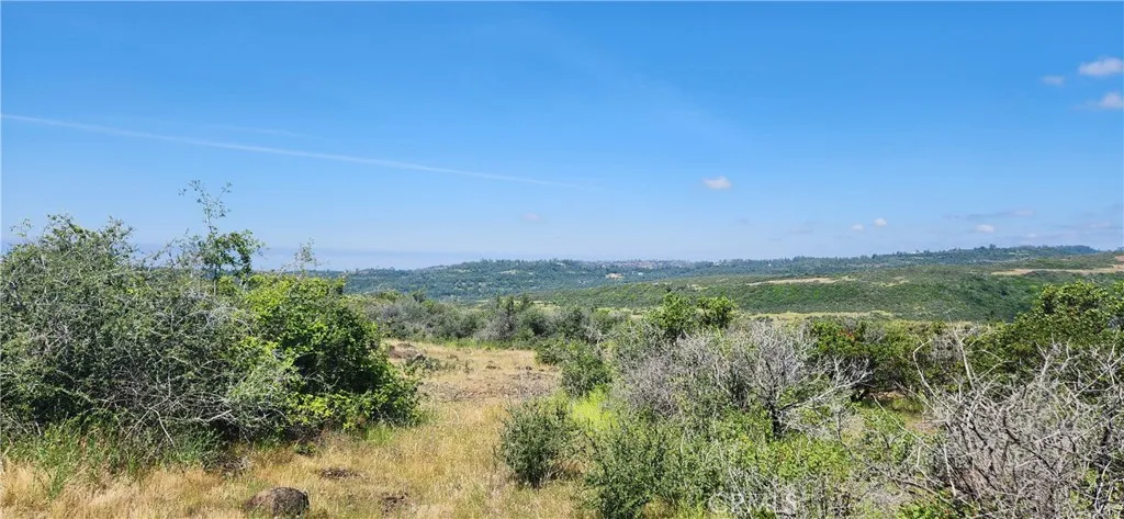 a view of lake with green space