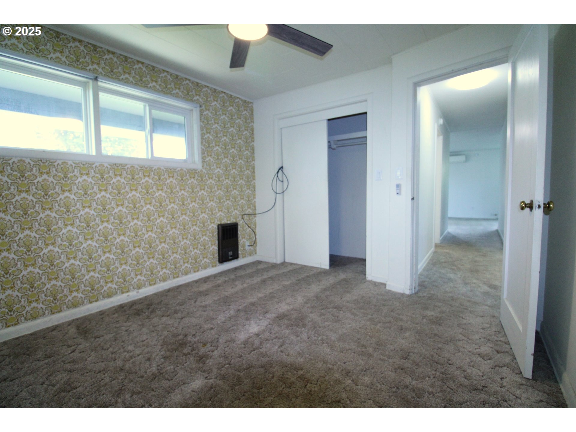 345 14th Street Springfield, OR 97477 - Photo 13 of 23 a view of an empty room and window