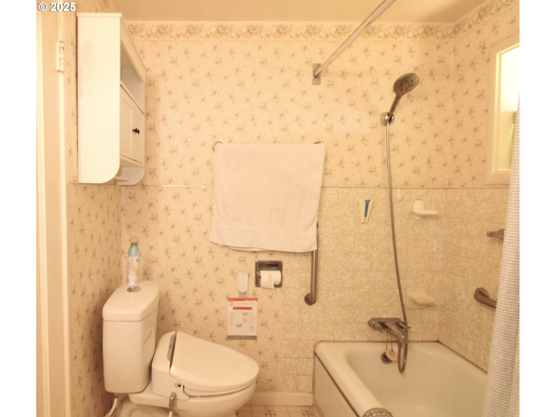 345 14th Street Springfield, OR 97477 - Photo 14 of 23 a bathroom with a sink a toilet and shower