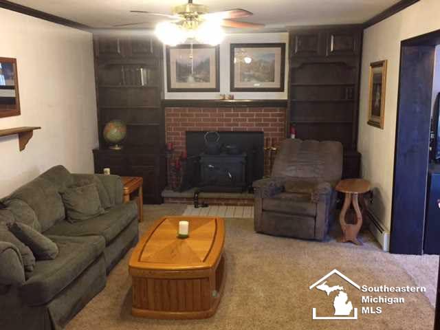 13055 Rosedale Boulevard Carleton, MI 48117 - Photo 12 of 30 Family with wood insert