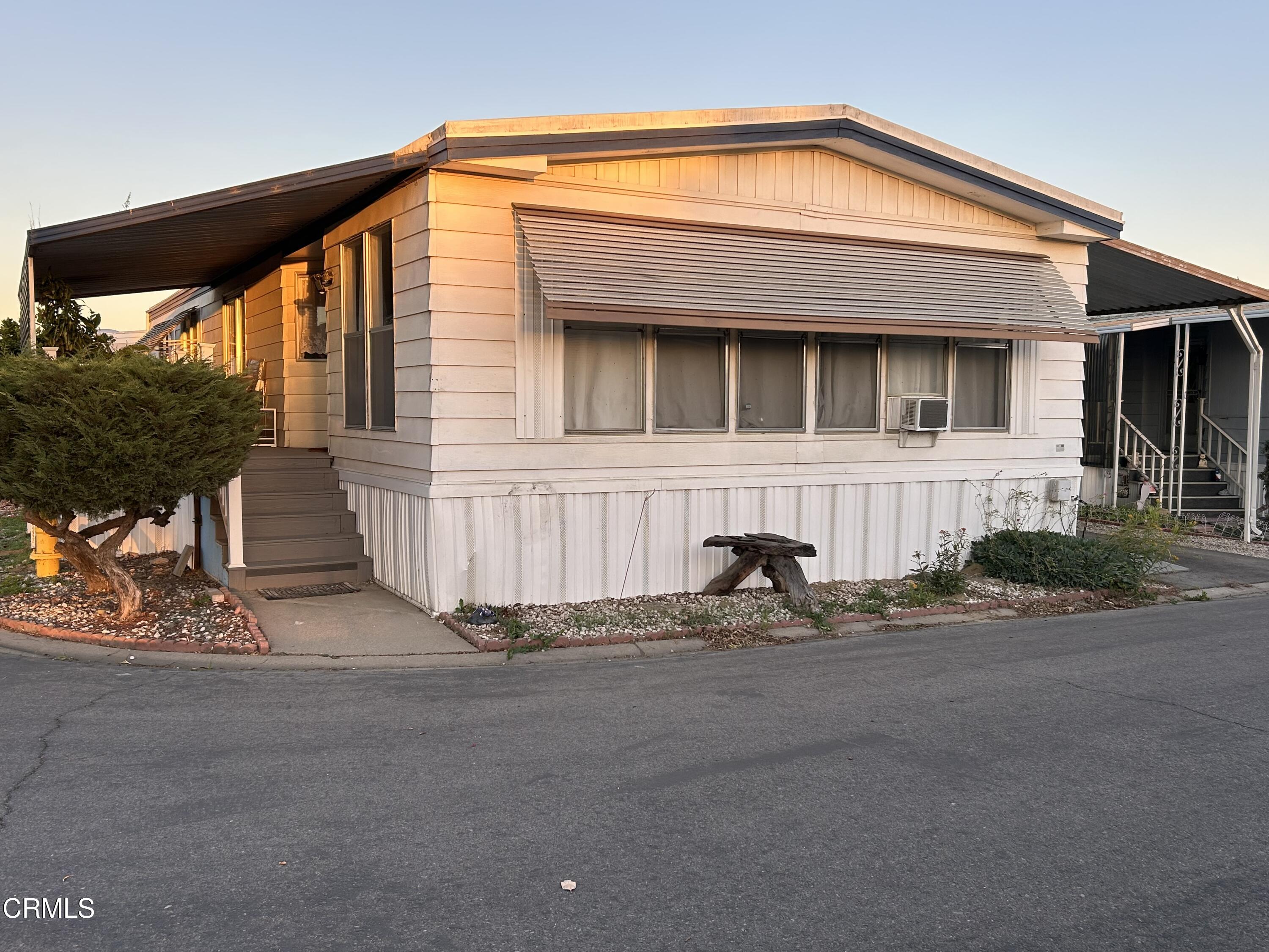 142 Geranium Way, Unit 142 Ventura, CA 93004 - Photo 1 of 23 a front view of a house