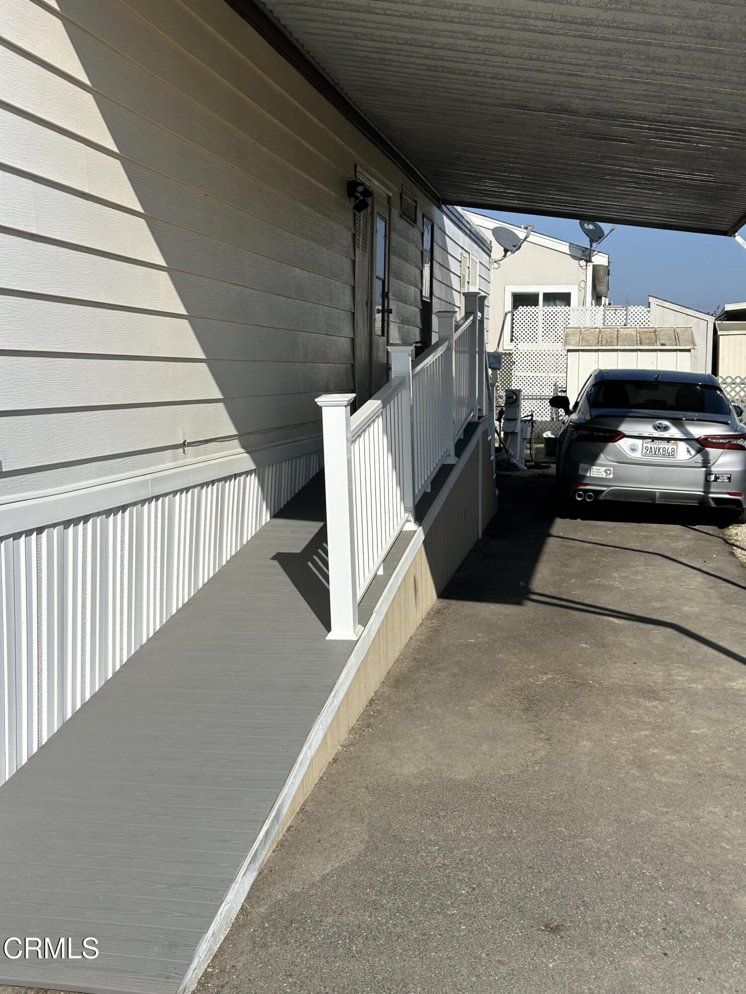 142 Geranium Way, Unit 142 Ventura, CA 93004 - Photo 23 of 23 a view of car parked in garage