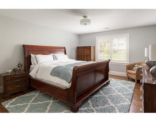 2 Cider Mill Lane Natick, MA 01760 - Photo 22 of 30 a bedroom with a bed and window