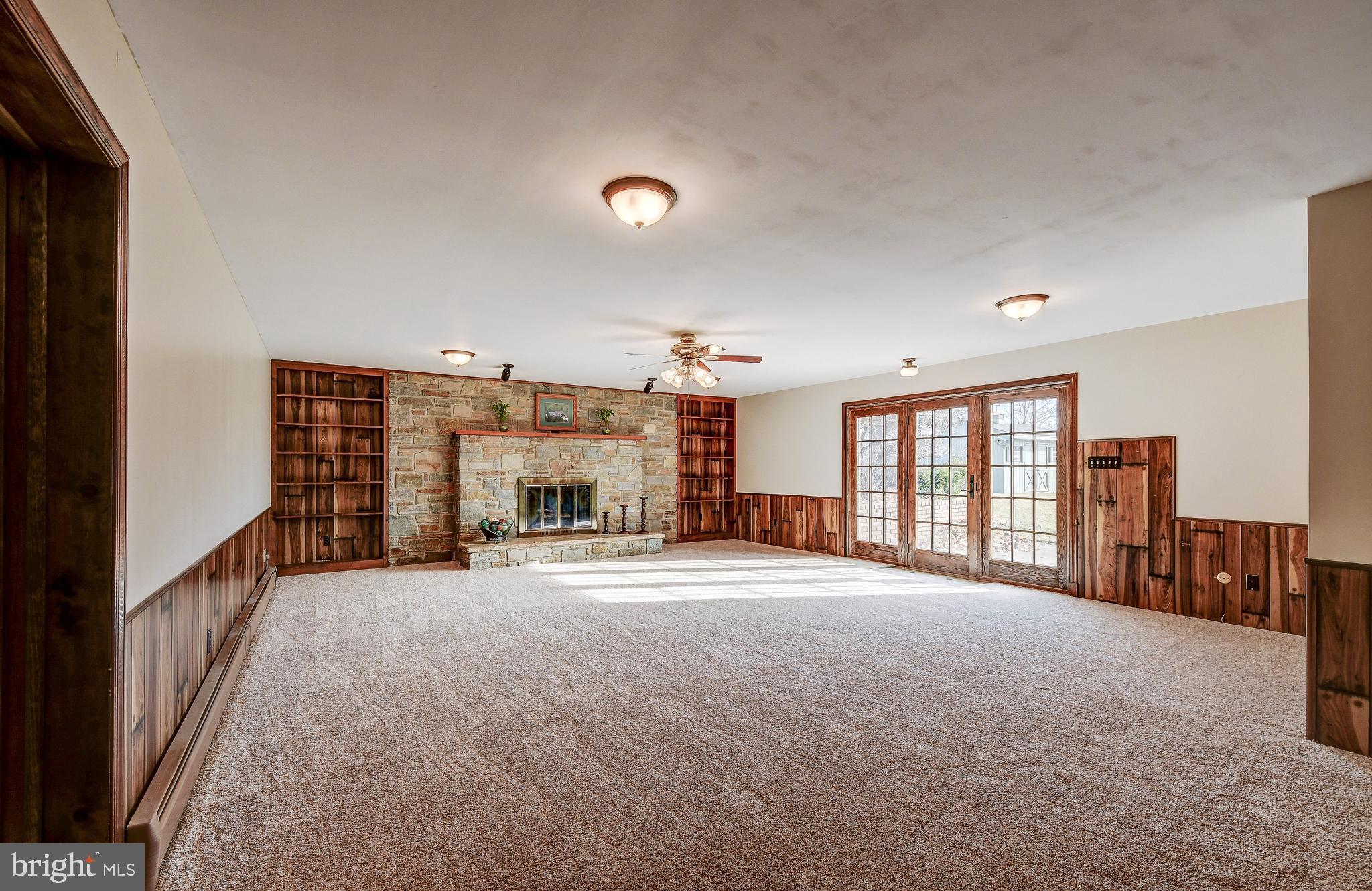 9 West McKinley Road Delta, PA 17314 - Photo 23 of 40 Lower Level Family Room with Stone Fire Place