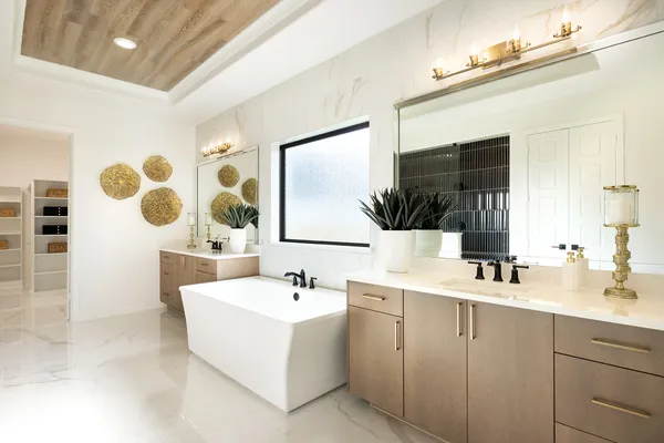 a bathroom with a double vanity sink mirror and