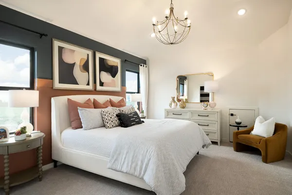 a bedroom with bed and window