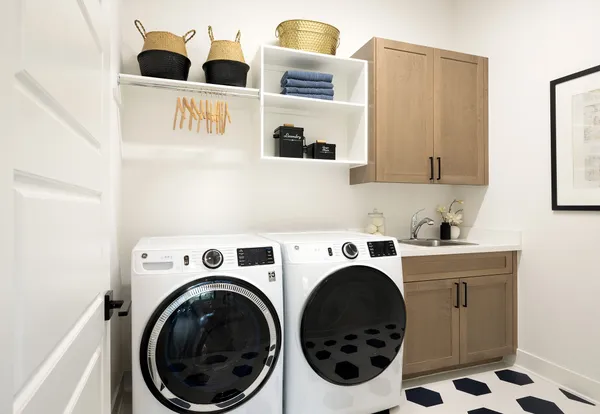 a utility room with dryer and washer