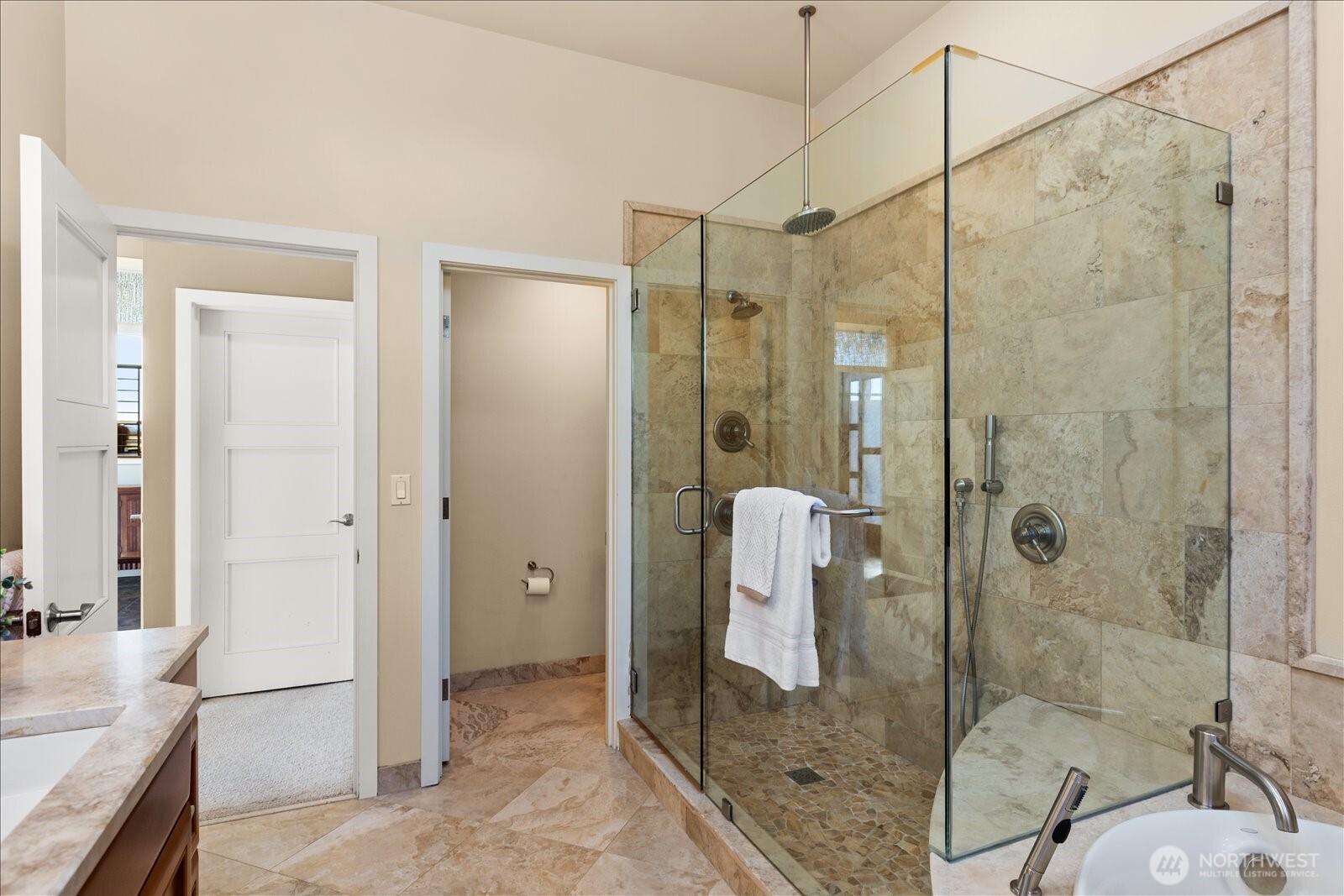 831 Northstream Lane Edmonds, WA 98020 - Photo 24 of 40 a bathroom with a shower and a sink