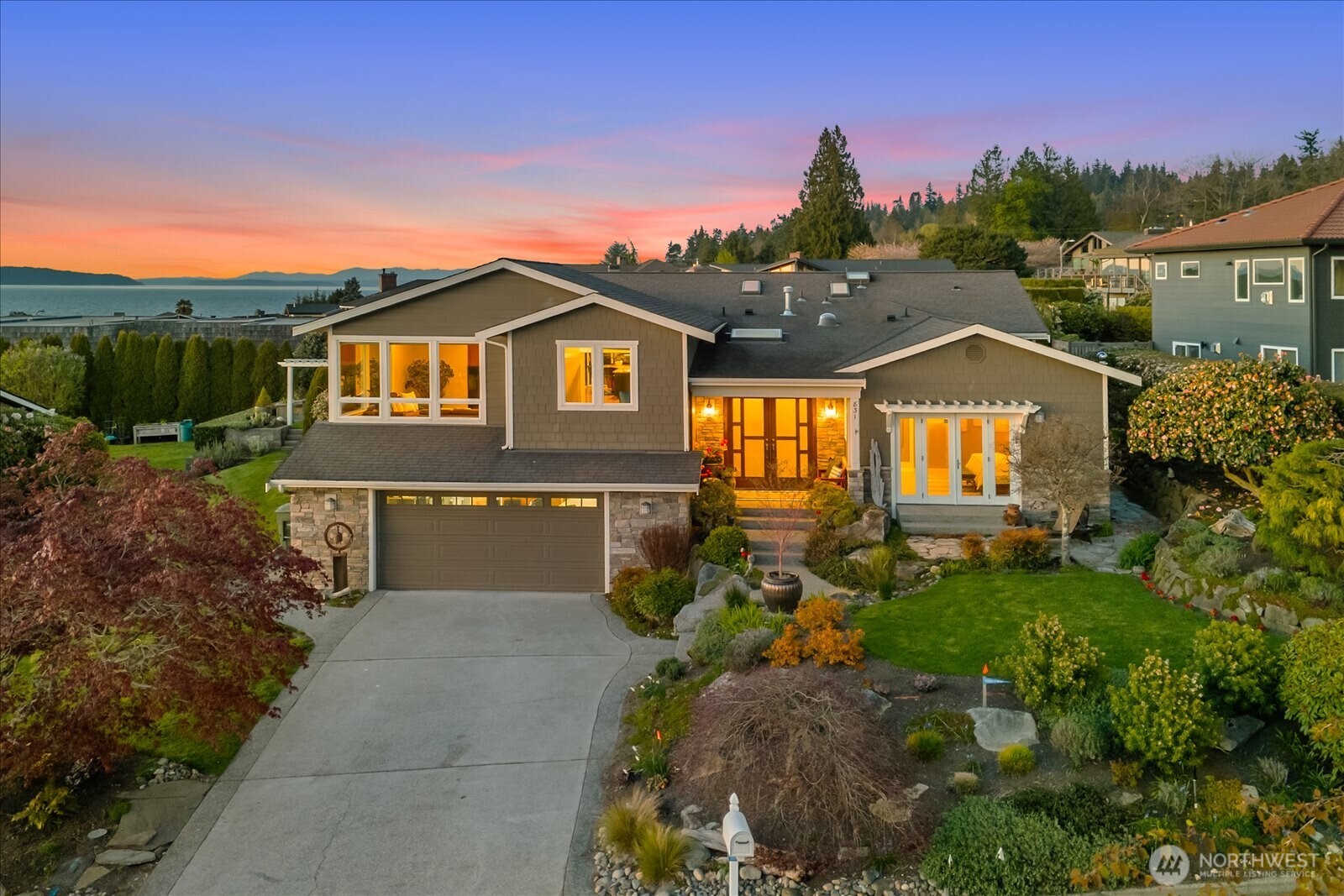 831 Northstream Lane Edmonds, WA 98020 - Photo 3 of 40 a front view of a house with a yard