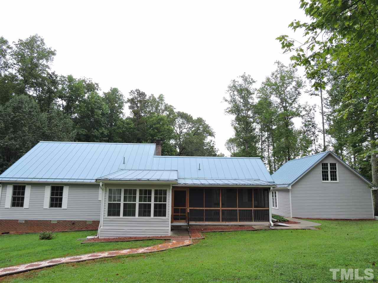 49 Epps Martin Road Roxboro, NC 27574 - Photo 13 of 25 a front view of a house with a yard