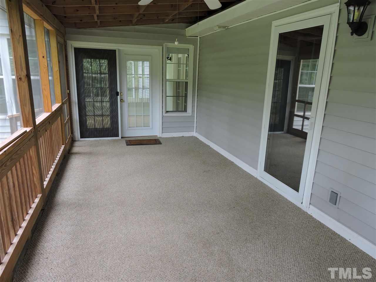49 Epps Martin Road Roxboro, NC 27574 - Photo 14 of 25 a view of an empty room with glass door