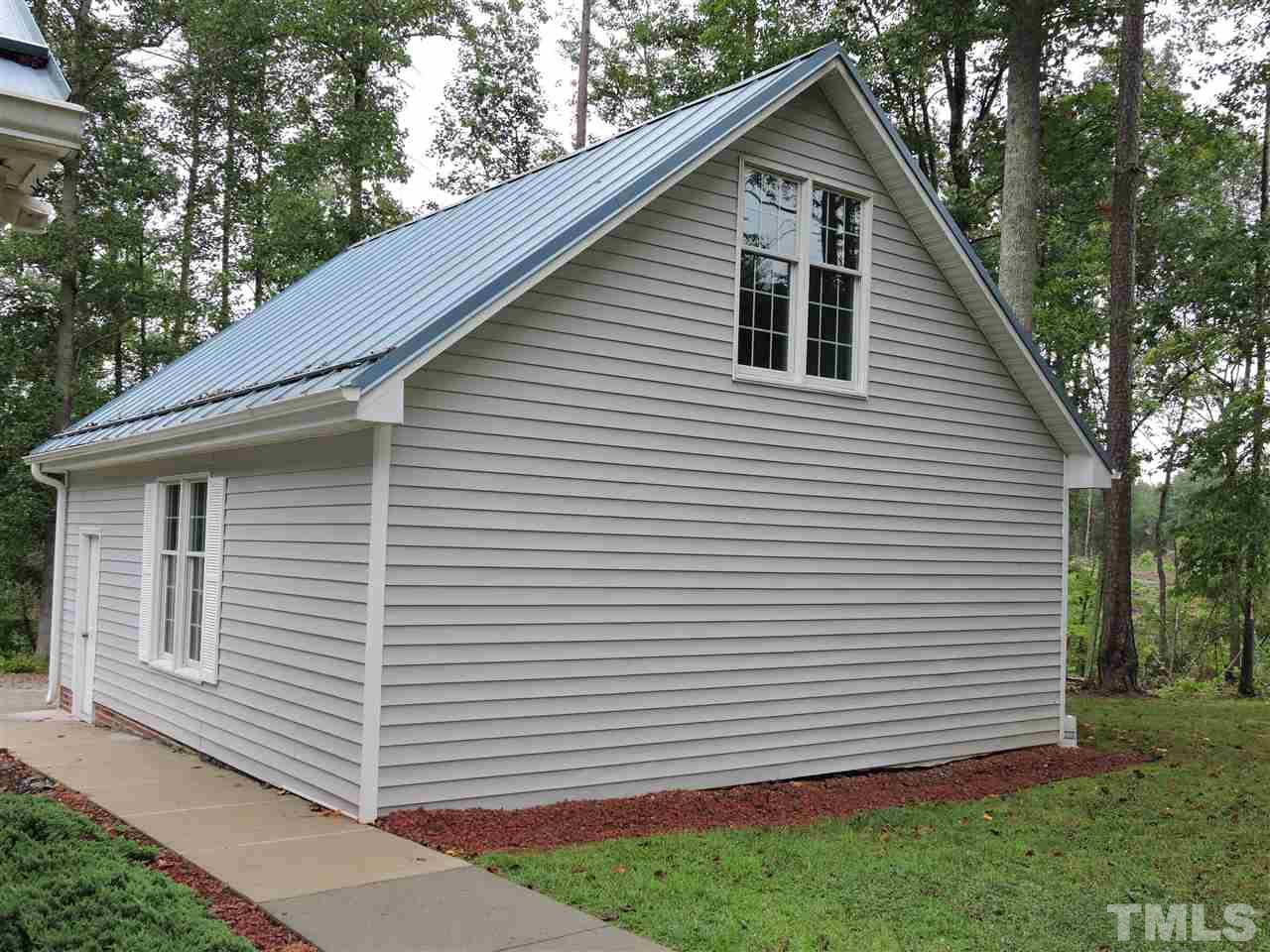 49 Epps Martin Road Roxboro, NC 27574 - Photo 17 of 25 a view of a house with a yard