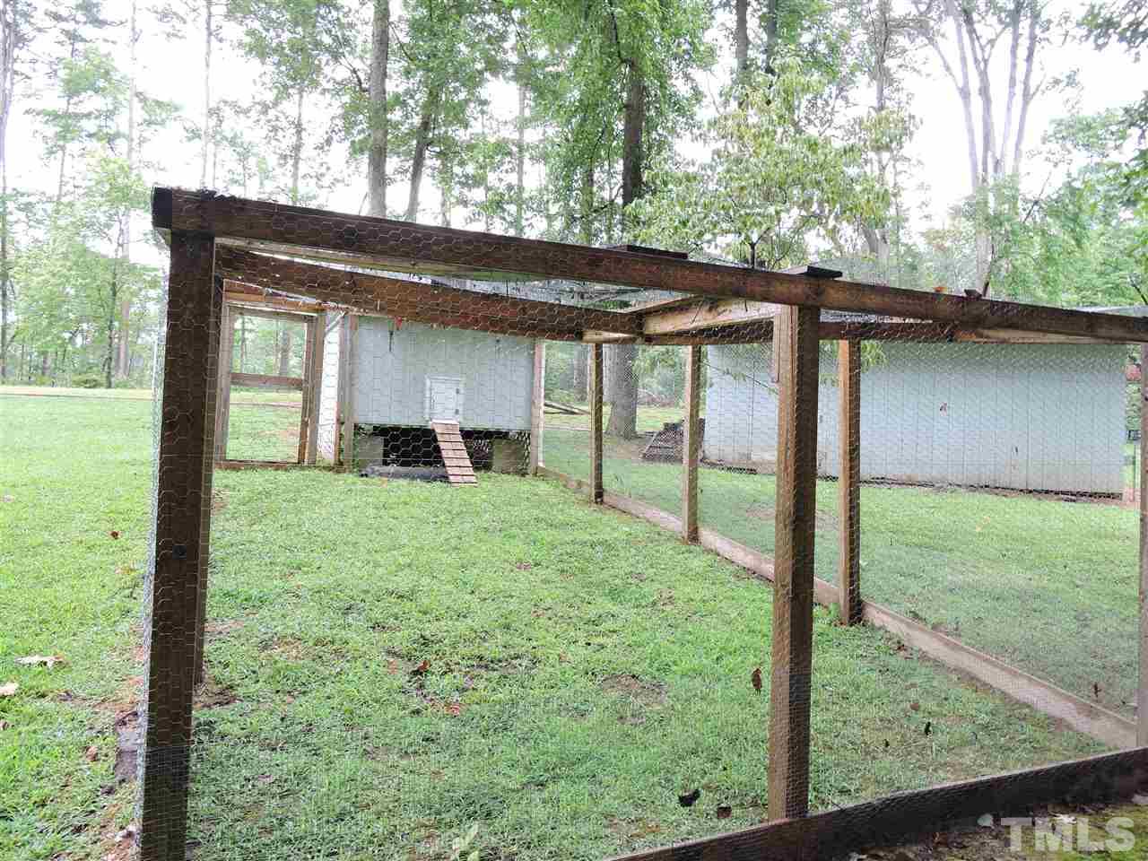 49 Epps Martin Road Roxboro, NC 27574 - Photo 21 of 25 a house view with a garden space