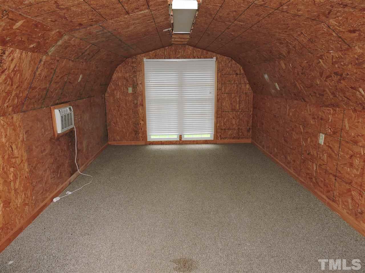 49 Epps Martin Road Roxboro, NC 27574 - Photo 22 of 25 a view of a livingroom with a fireplace