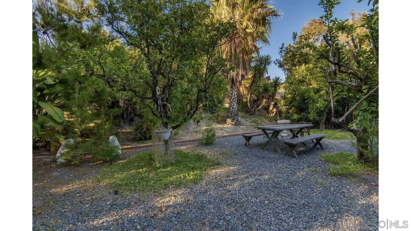 4704 Rim Rock Road Oceanside, CA 92056 - Photo 4 of 11 a view of a park with large trees