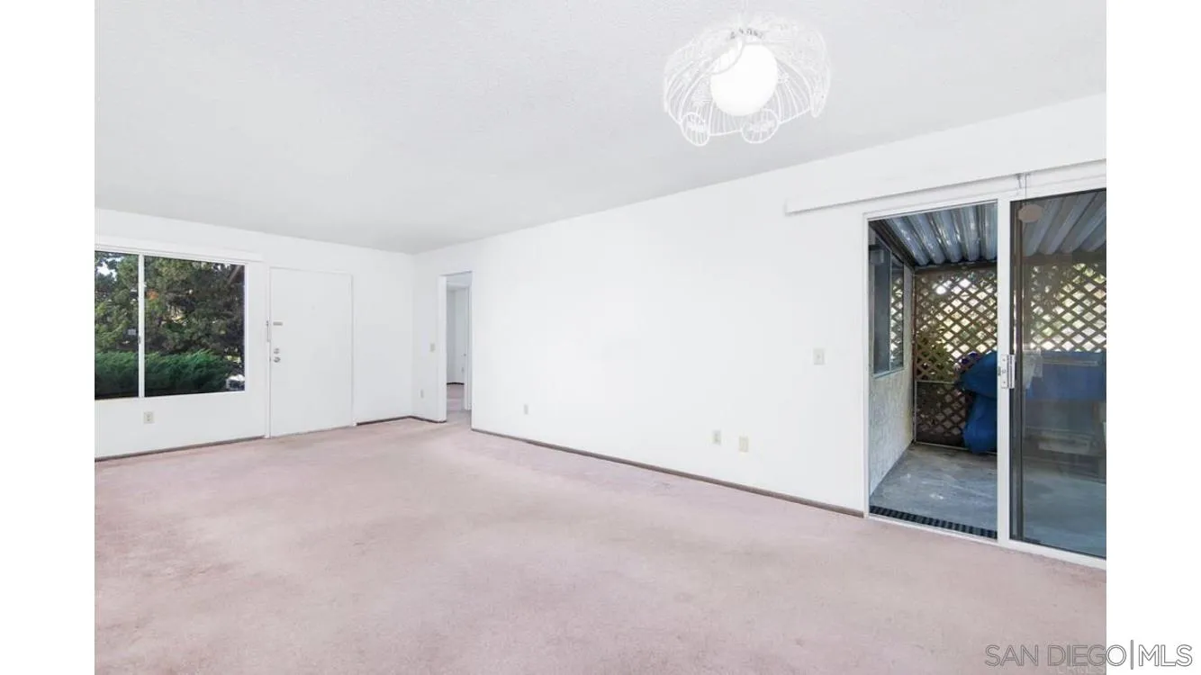 4704 Rim Rock Road Oceanside, CA 92056 - Photo 5 of 11 an empty room with windows