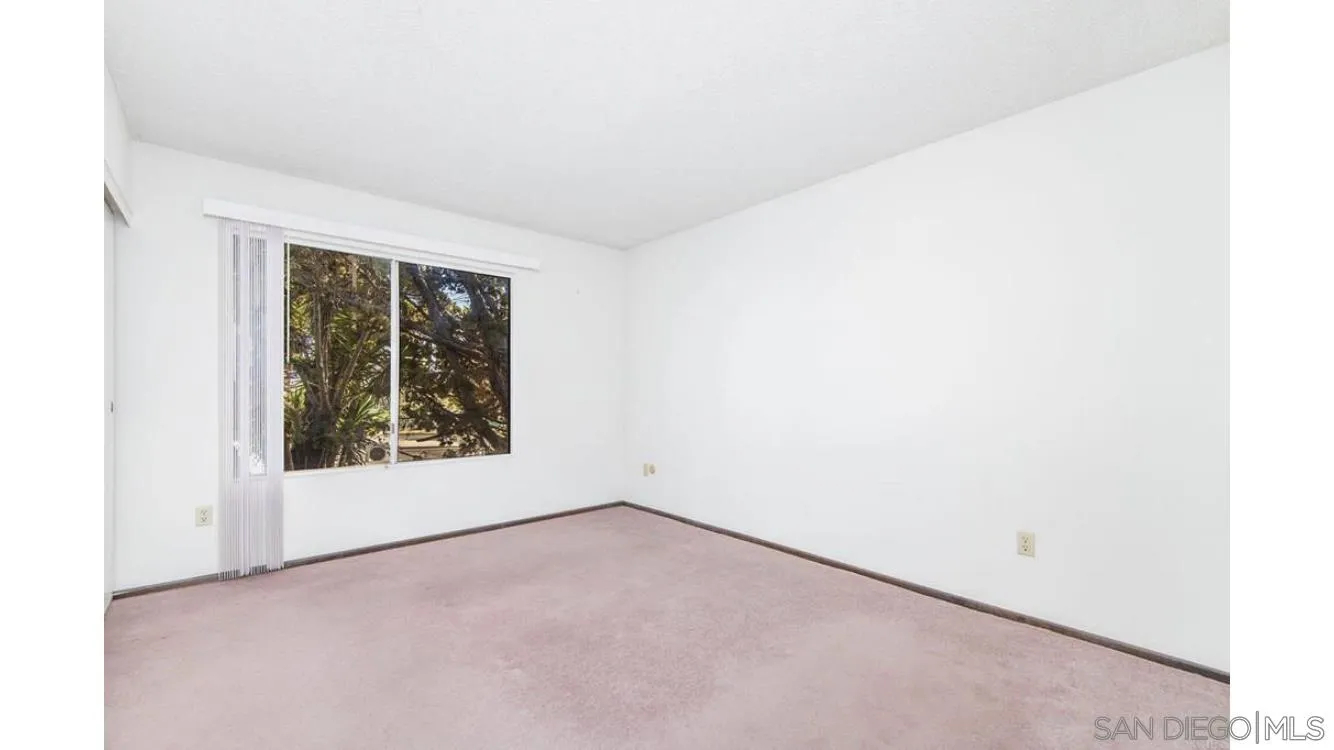 4704 Rim Rock Road Oceanside, CA 92056 - Photo 10 of 11 an empty room with a window