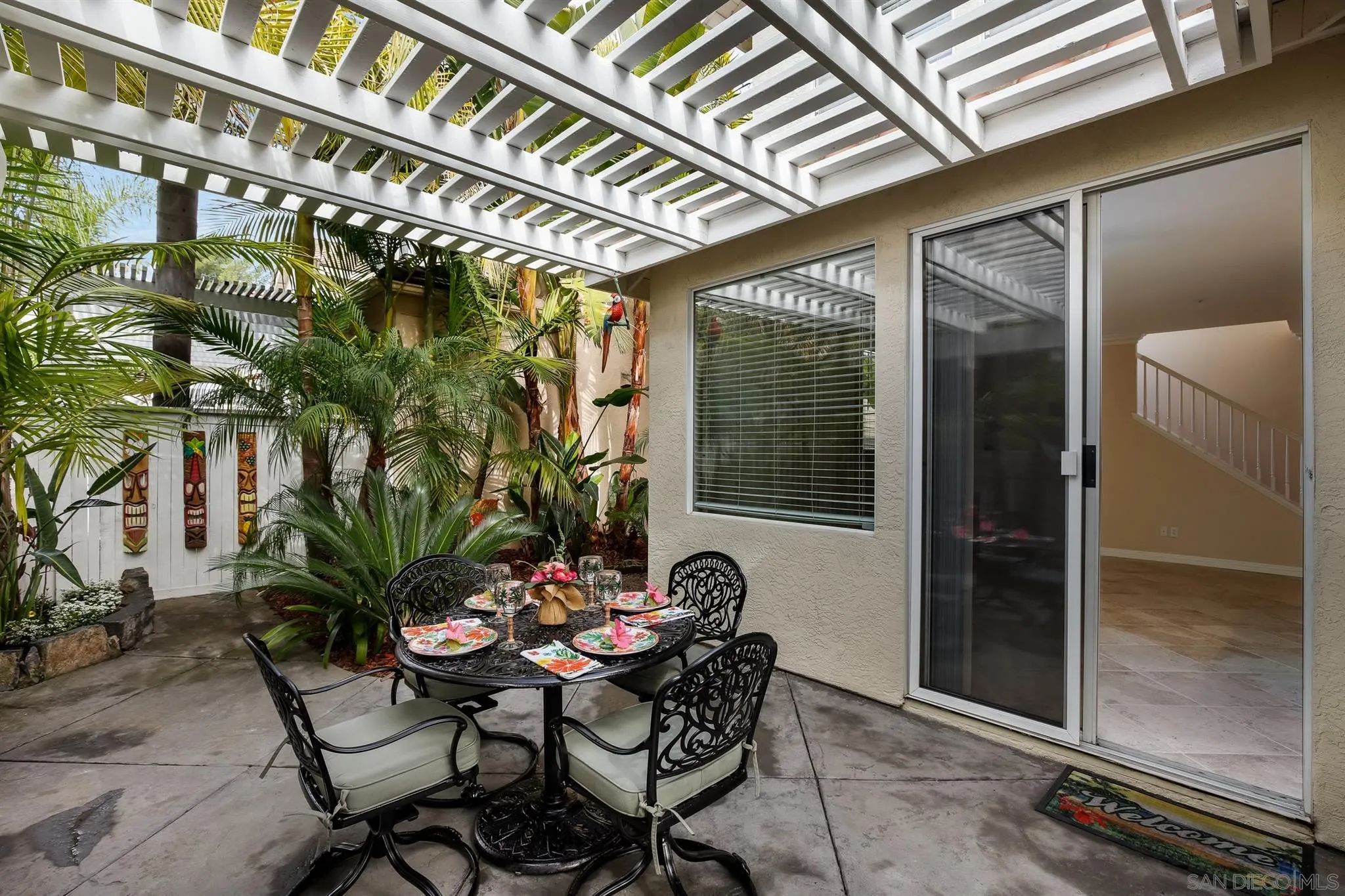 1983 Courage Street Vista, CA 92081 - Photo 27 of 33 a backyard of a house with table and chairs
