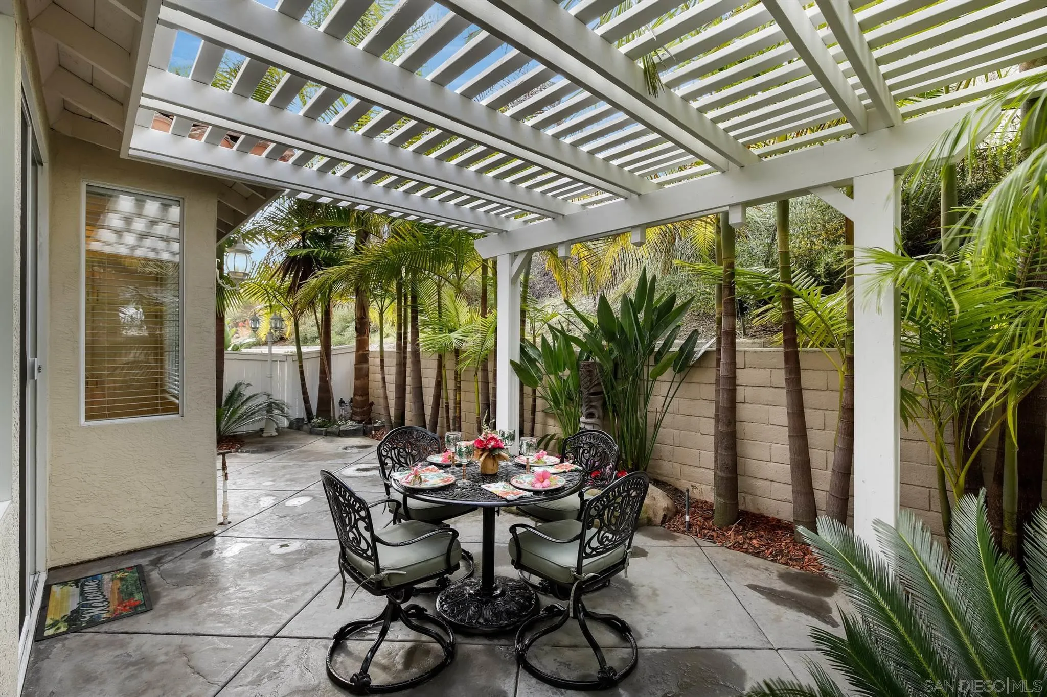 1983 Courage Street Vista, CA 92081 - Photo 28 of 33 a view of an outdoor dining space with a table and chairs