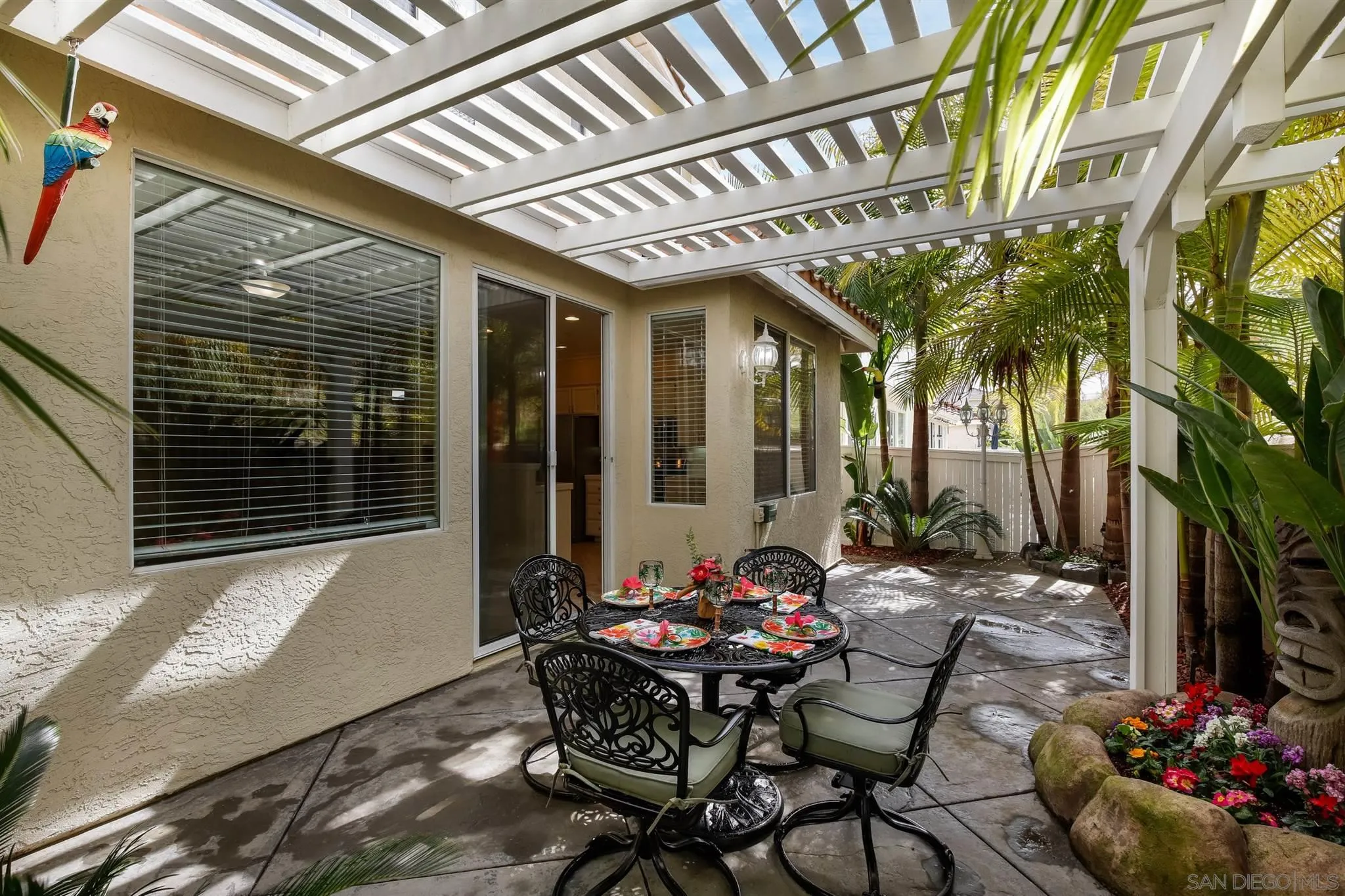 1983 Courage Street Vista, CA 92081 - Photo 29 of 33 a view of a patio with table and chairs and potted plants