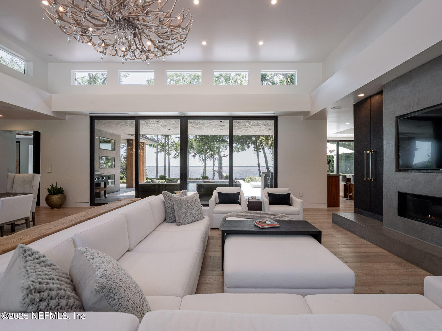 842 Fruit Cove Road St. Johns, FL 32259 - Photo 18 of 100 a living room with furniture and a flat screen tv