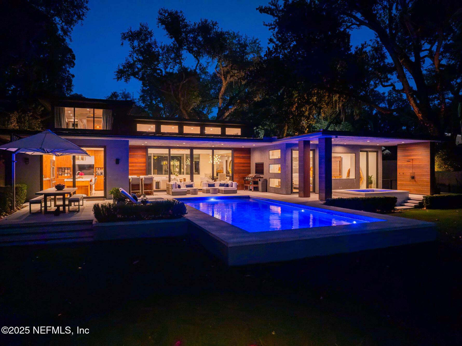 842 Fruit Cove Road St. Johns, FL 32259 - Photo 27 of 100 a view of swimming pool with a table & chairs