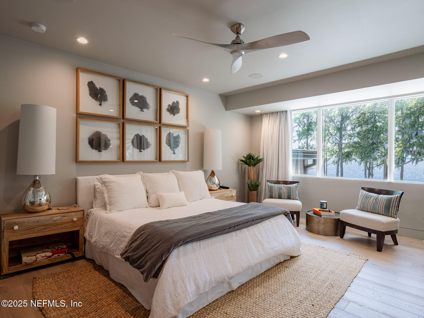 842 Fruit Cove Road St. Johns, FL 32259 - Photo 50 of 100 a spacious bedroom with a large bed and a couch