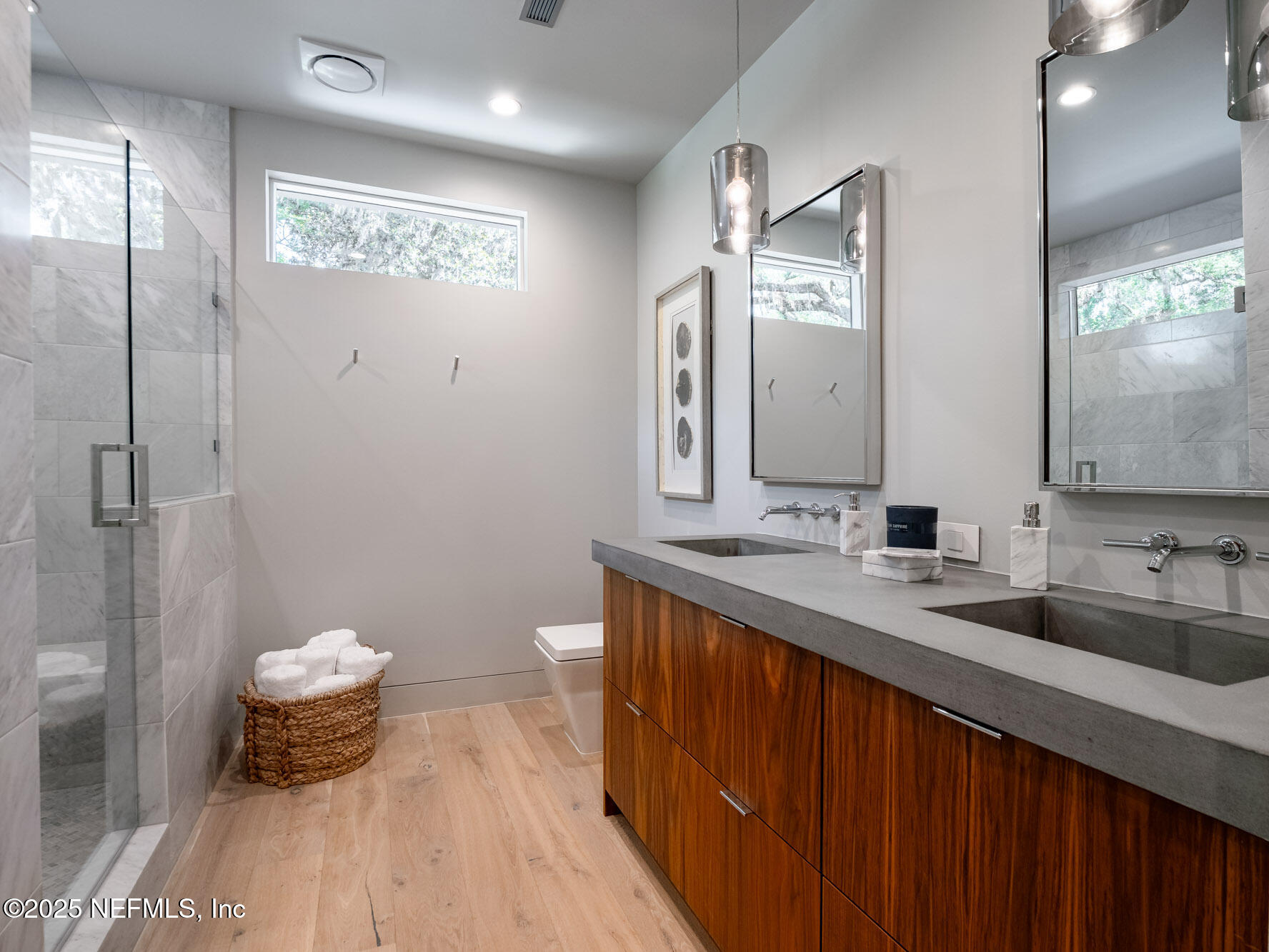 842 Fruit Cove Road St. Johns, FL 32259 - Photo 52 of 100 a bathroom with a double vanity sink and a mirror