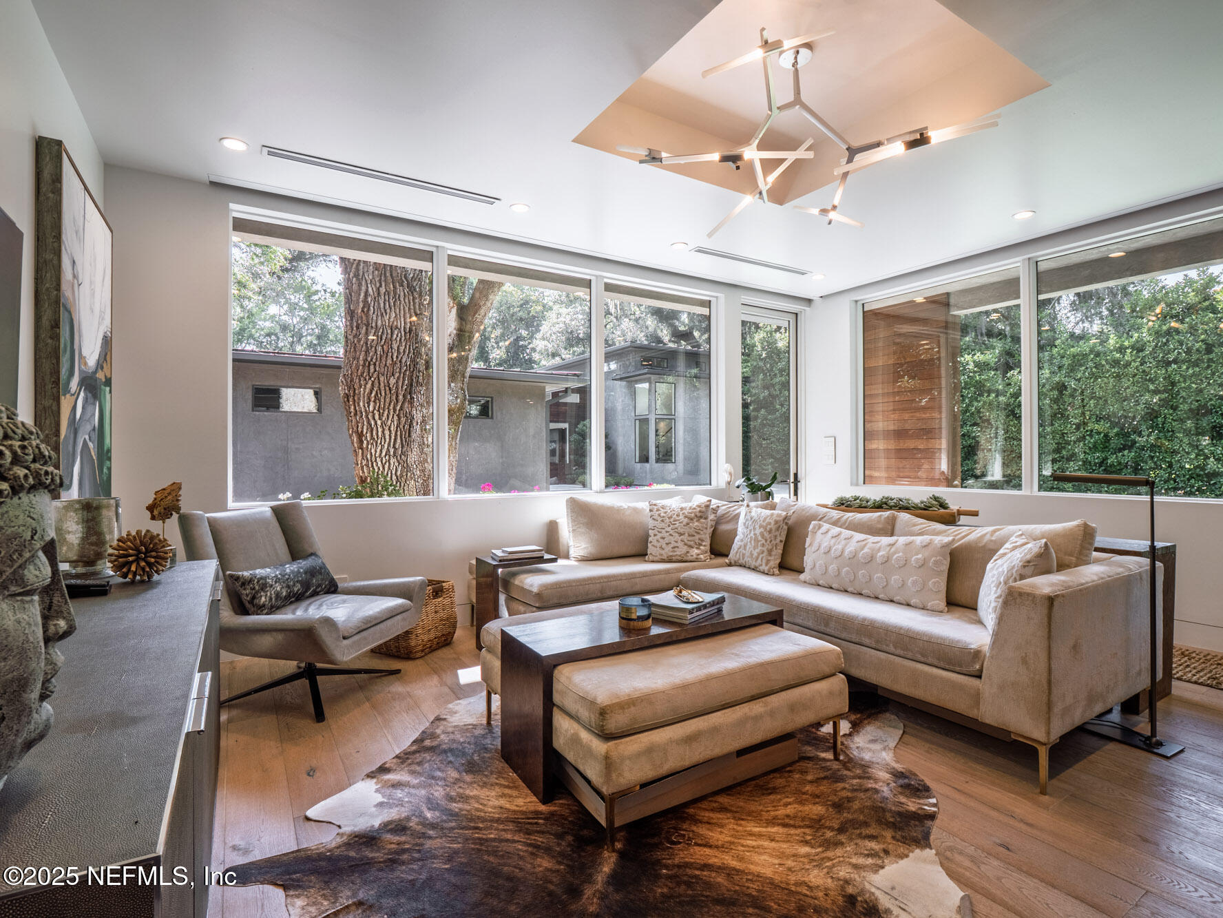 842 Fruit Cove Road St. Johns, FL 32259 - Photo 57 of 100 a living room with furniture ceiling fan and a large window