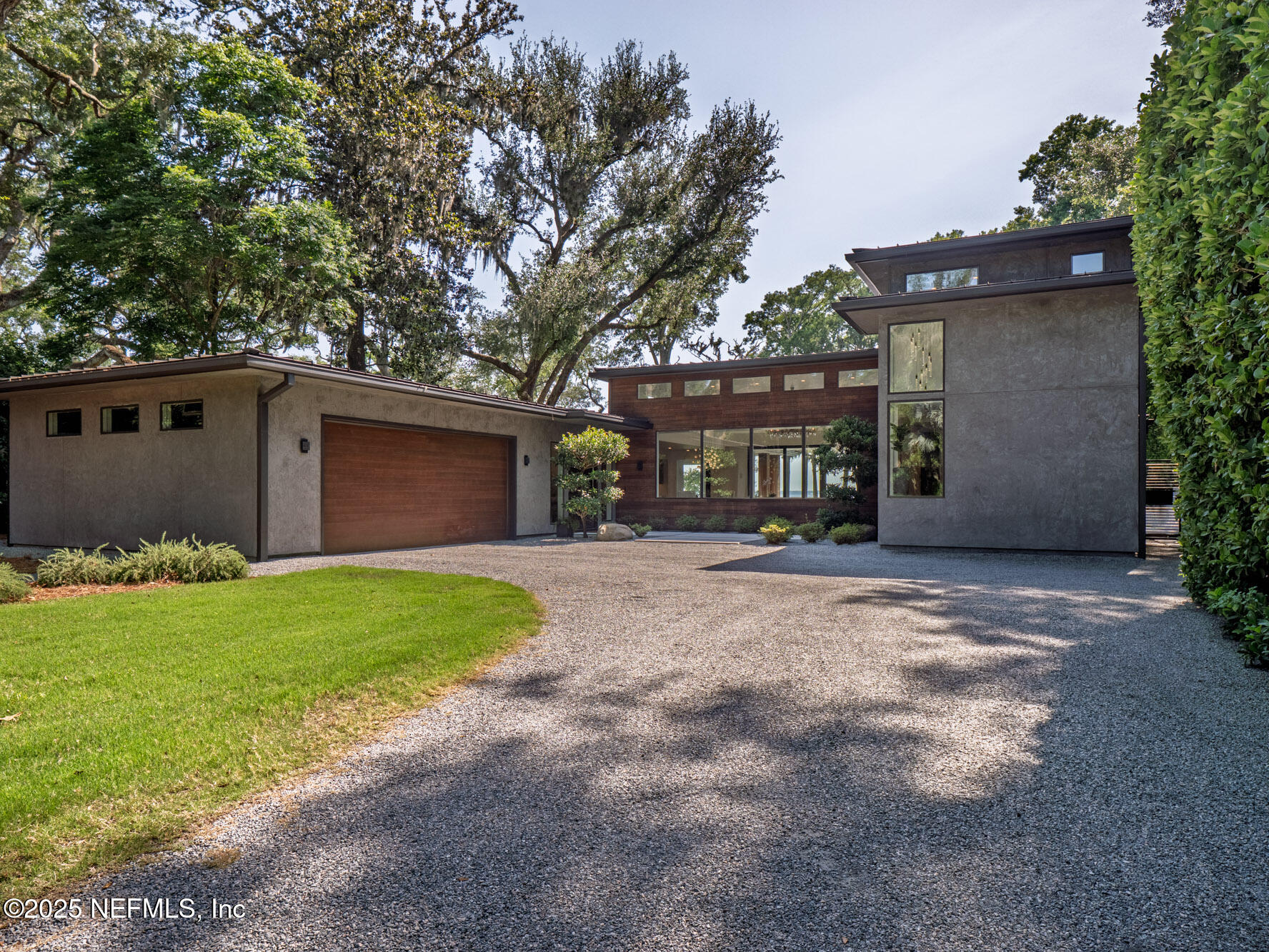 842 Fruit Cove Road St. Johns, FL 32259 - Photo 64 of 100 a view of a house with a yard and garage