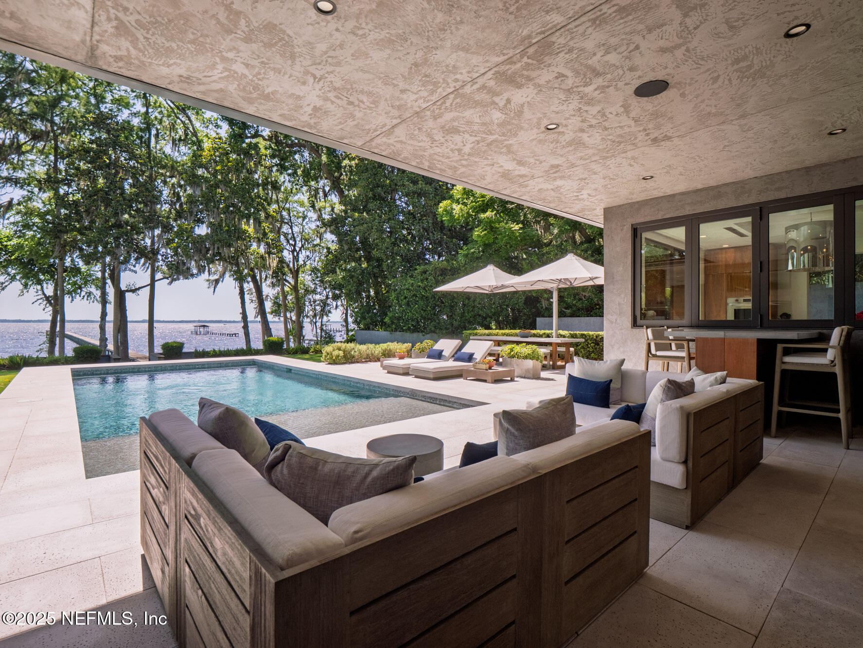 842 Fruit Cove Road St. Johns, FL 32259 - Photo 65 of 100 a view of swimming pool with outdoor seating and outdoor seating