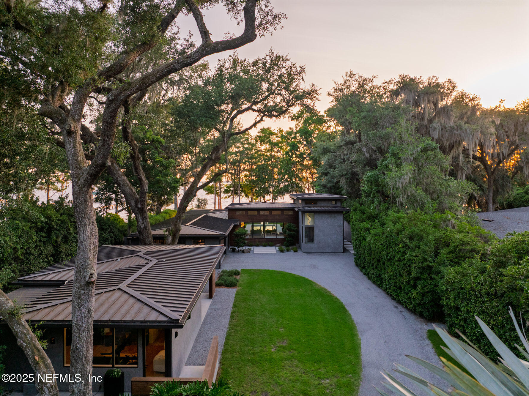 842 Fruit Cove Road St. Johns, FL 32259 - Photo 10 of 100 a aerial view of a house with a yard table and chairs