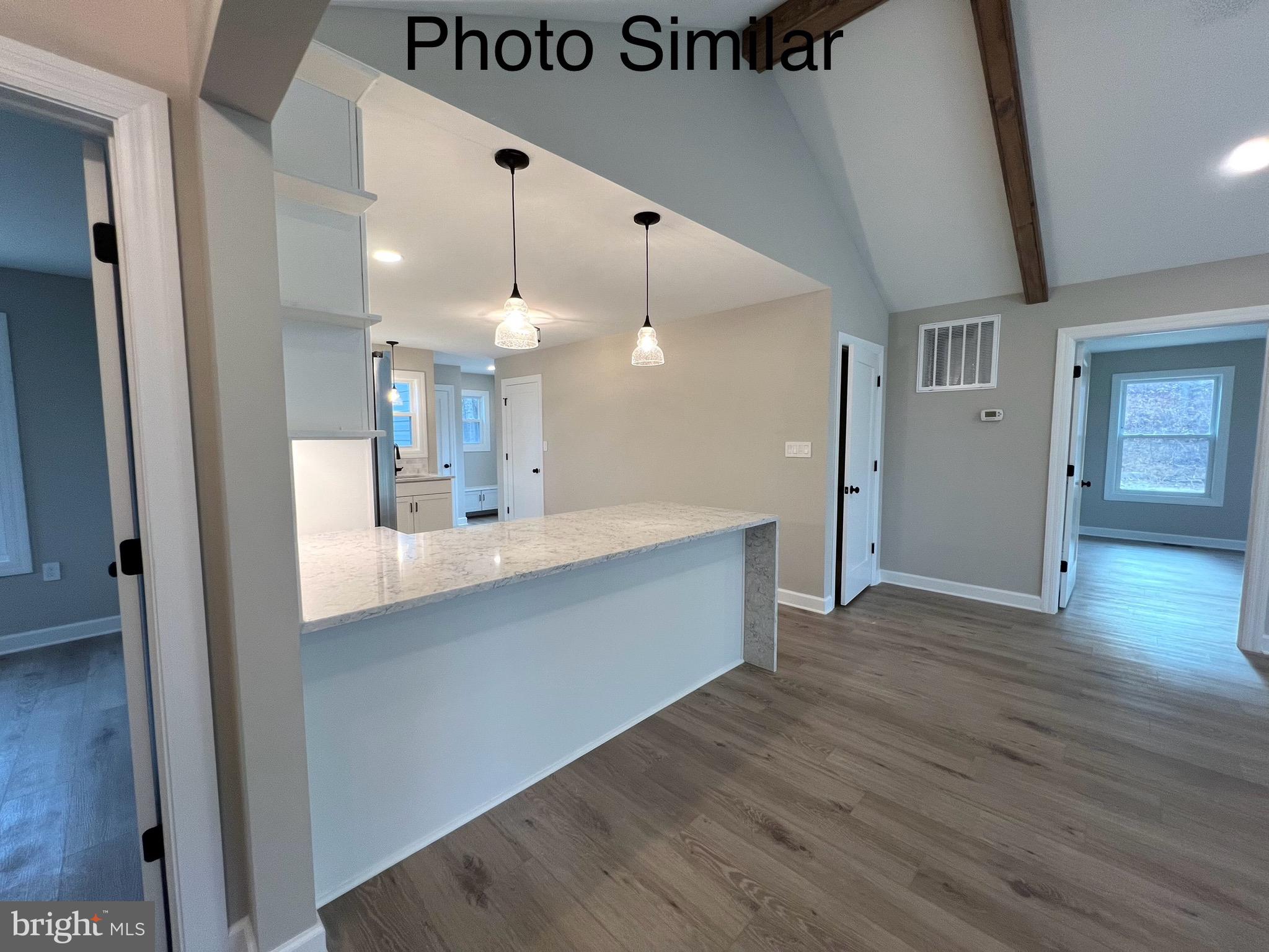 0 Sleepy Hollow Road Linden, VA 22642 - Photo 12 of 48 a large space with kitchen view and wooden floor