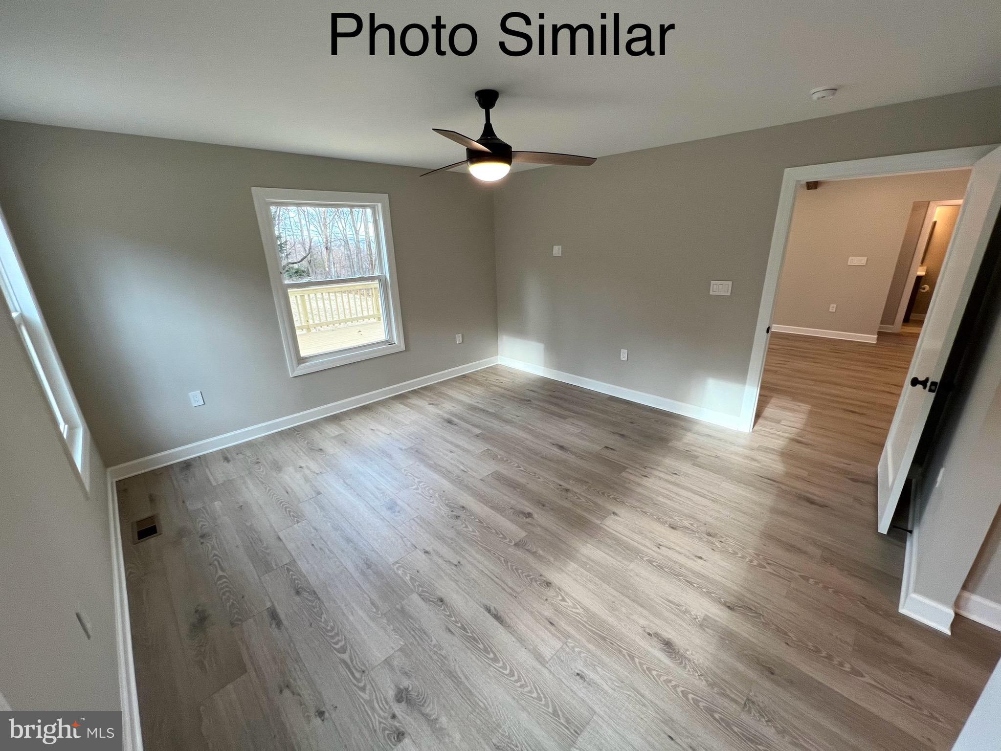 0 Sleepy Hollow Road Linden, VA 22642 - Photo 23 of 48 wooden floor in an empty room with a window