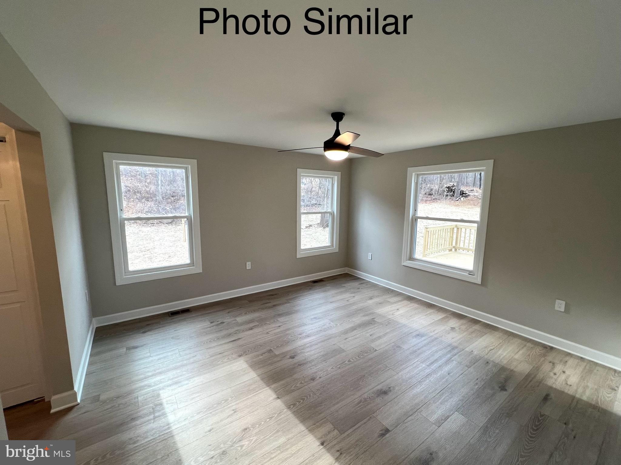 0 Sleepy Hollow Road Linden, VA 22642 - Photo 26 of 48 a view of an empty room with a window and wooden floor