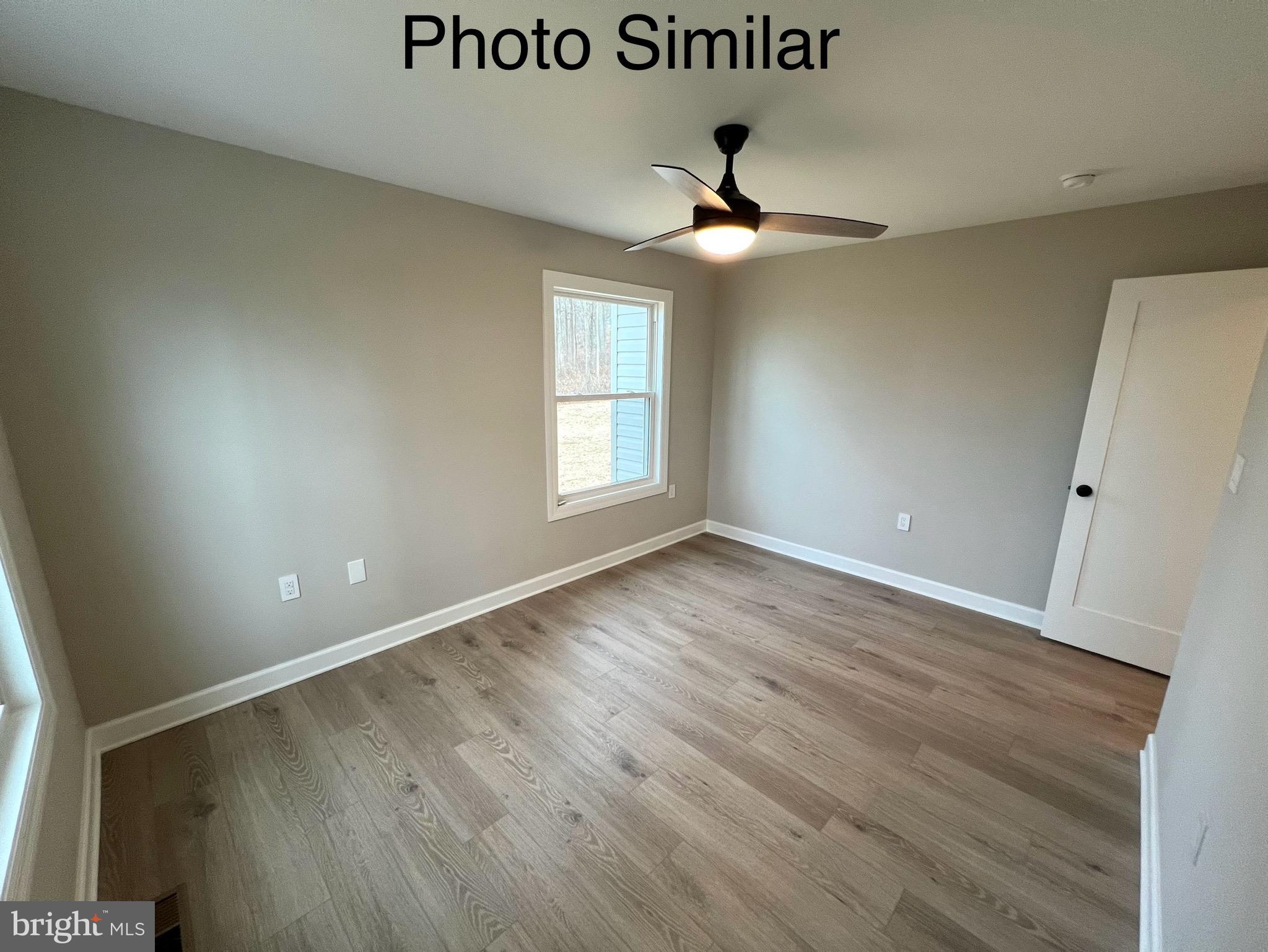 0 Sleepy Hollow Road Linden, VA 22642 - Photo 35 of 48 an empty room with wooden floor and windows