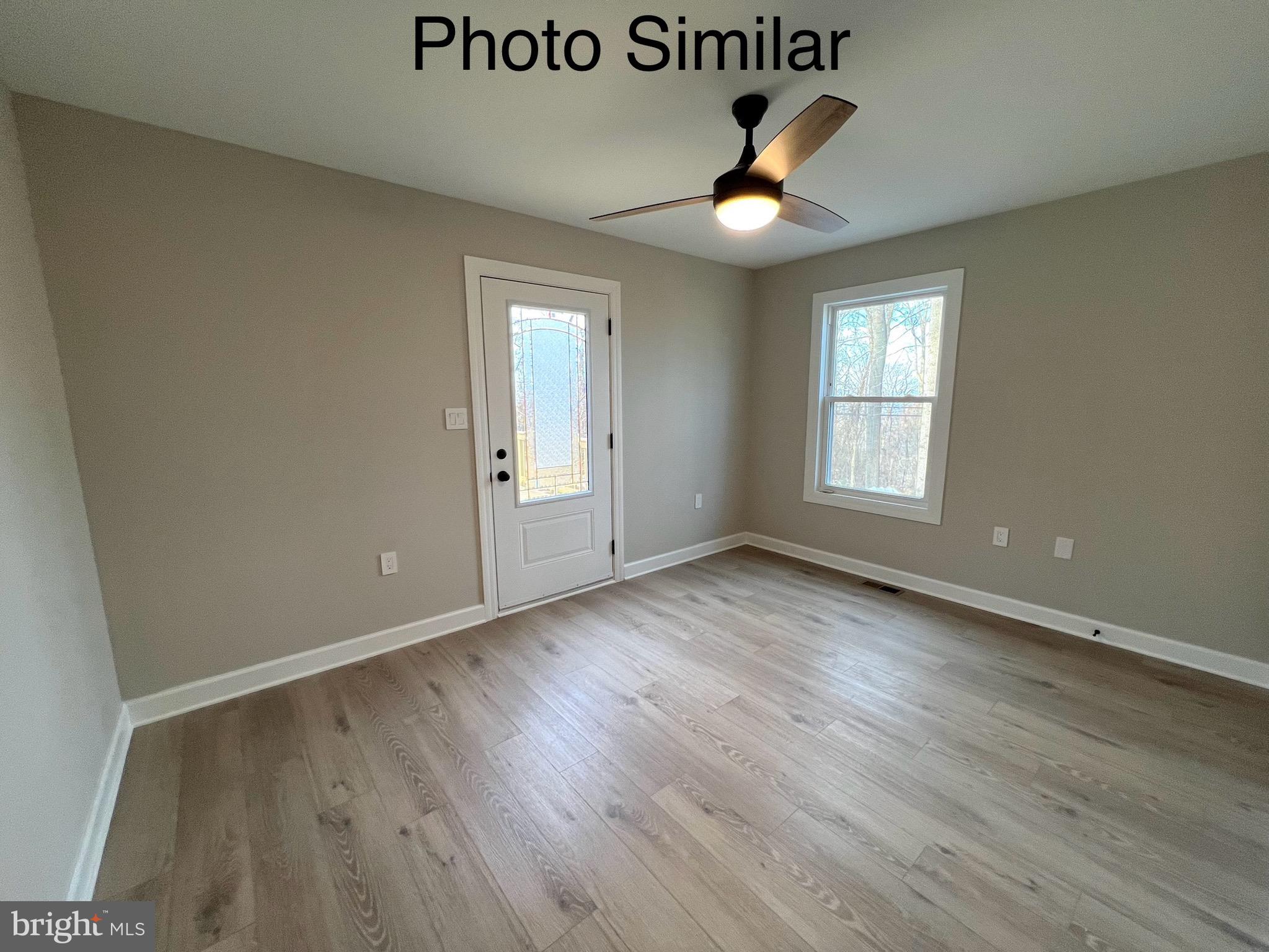 0 Sleepy Hollow Road Linden, VA 22642 - Photo 42 of 48 an empty room with wooden floor and windows