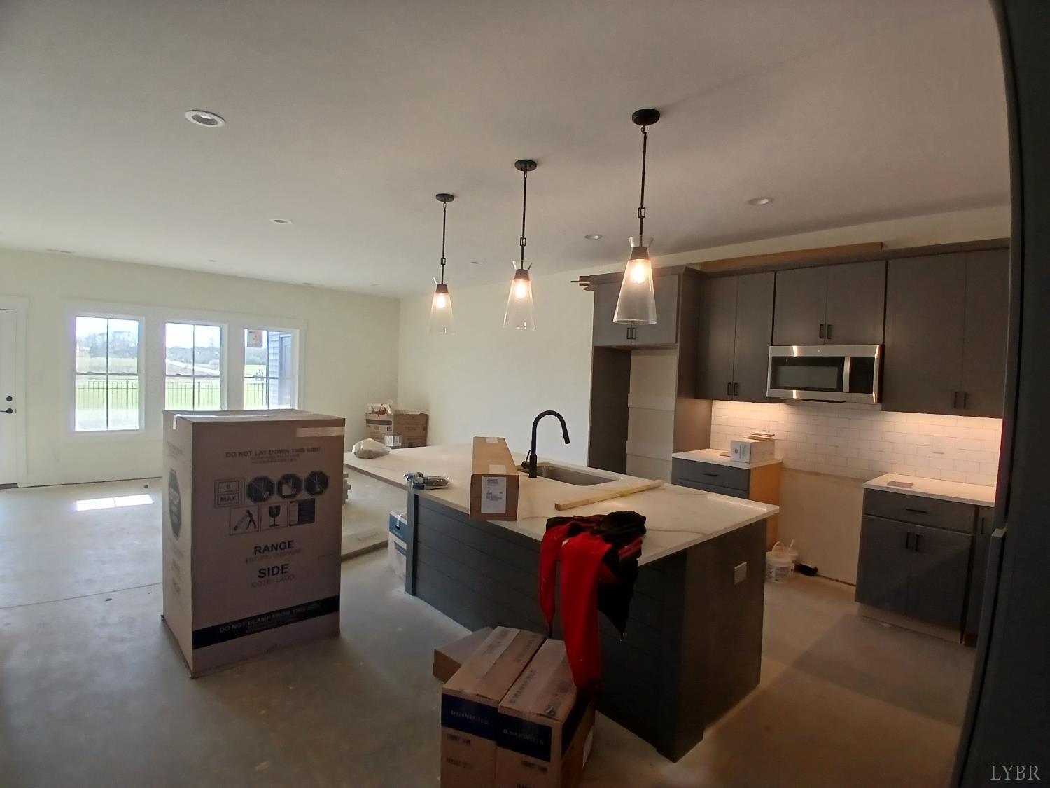 10 Faith Court Rustburg, VA 24588 - Photo 4 of 20 a kitchen with stainless steel appliances granite countertop a sink dishwasher a stove and a refrigerator with wooden floor