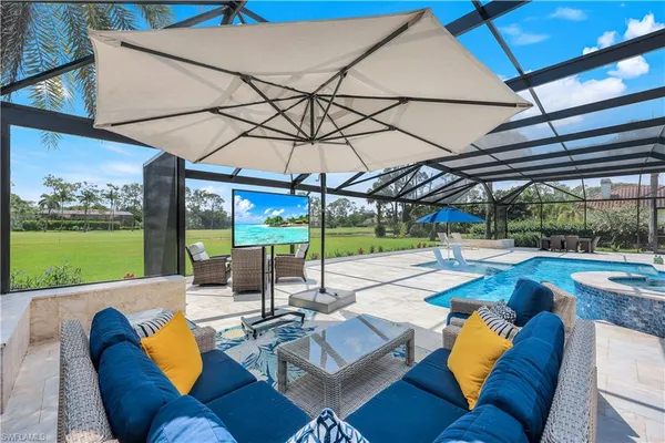 a view of a patio with swimming pool