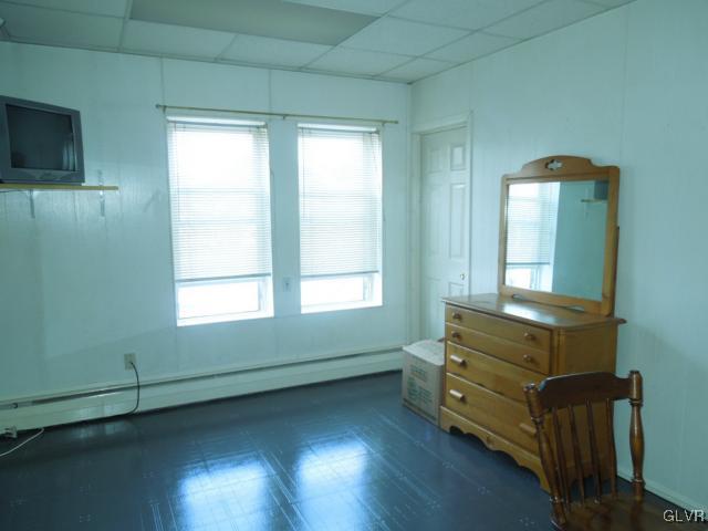 238 East Raspberry Street Bethlehem, PA 18018 - Photo 11 of 17 an empty room with wooden floor and windows