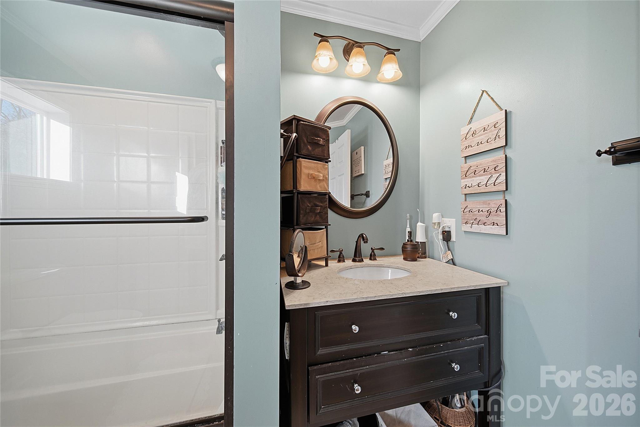 35 Boyden Street Badin, NC 28009 - Photo 13 of 36 a bathroom with a sink vanity and a mirror