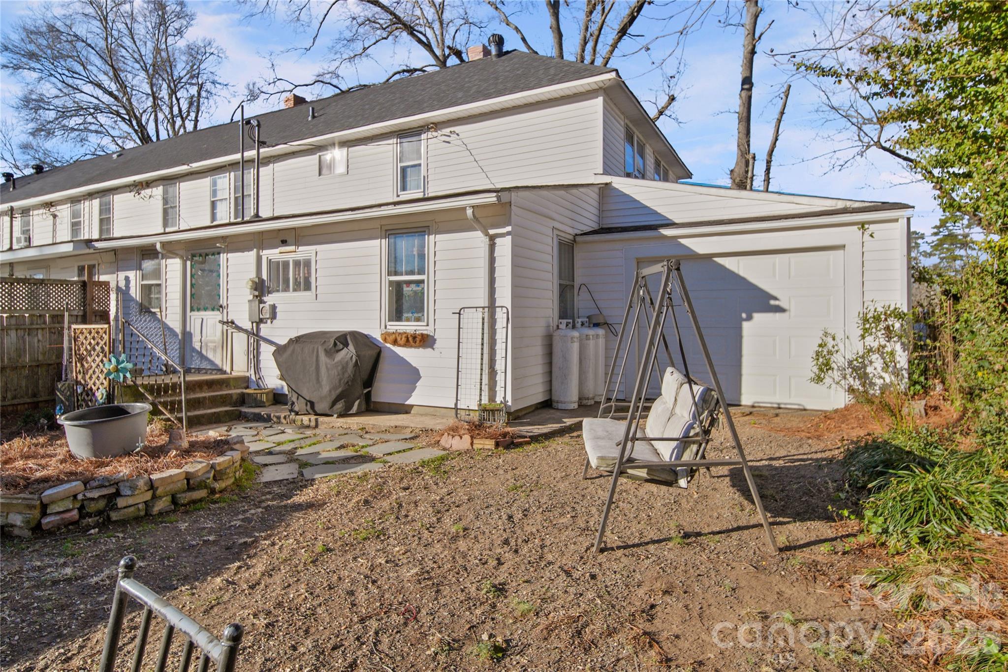 35 Boyden Street Badin, NC 28009 - Photo 32 of 36 a view of a house with snow