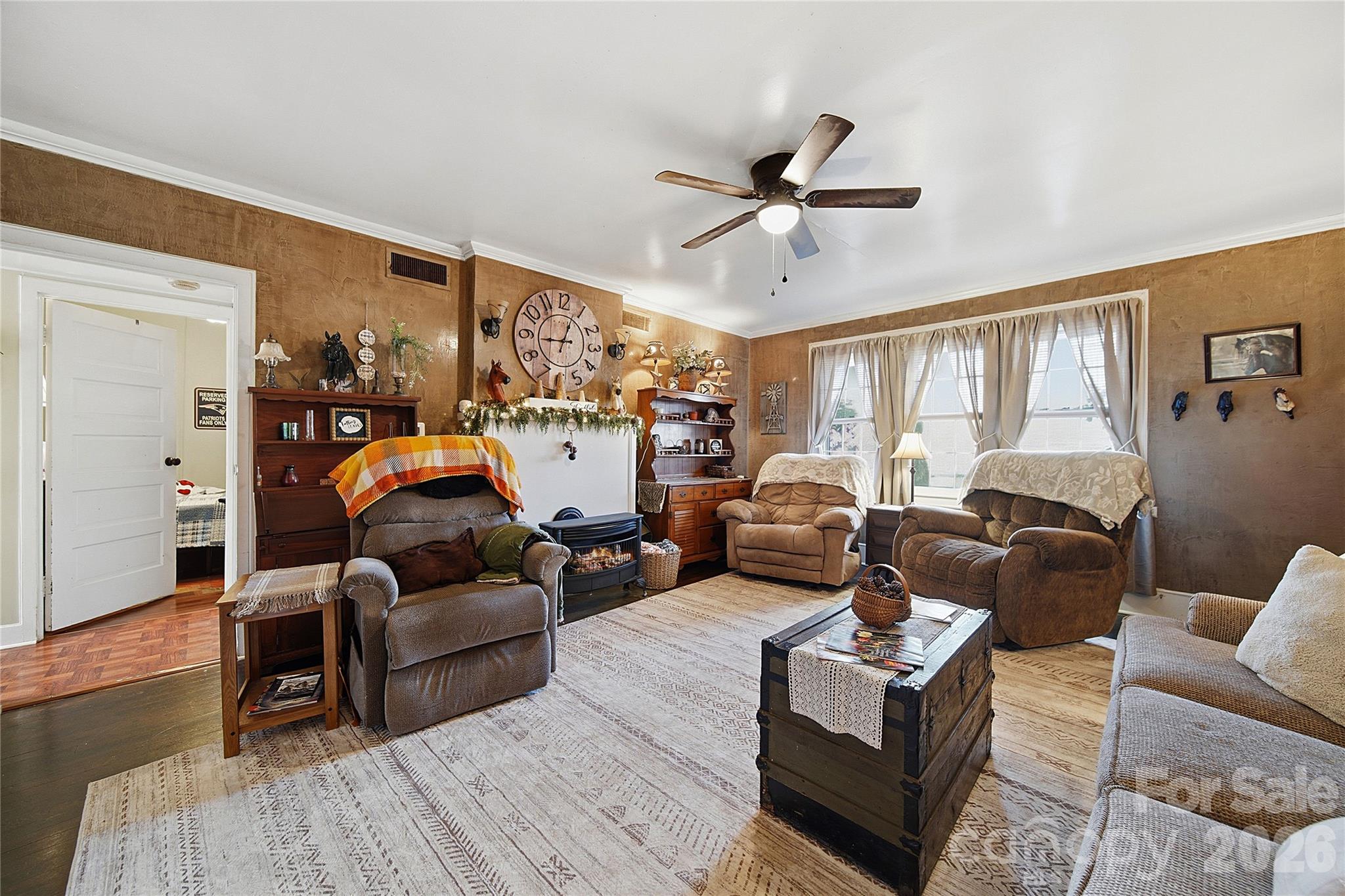 35 Boyden Street Badin, NC 28009 - Photo 8 of 36 a living room with furniture and a large window