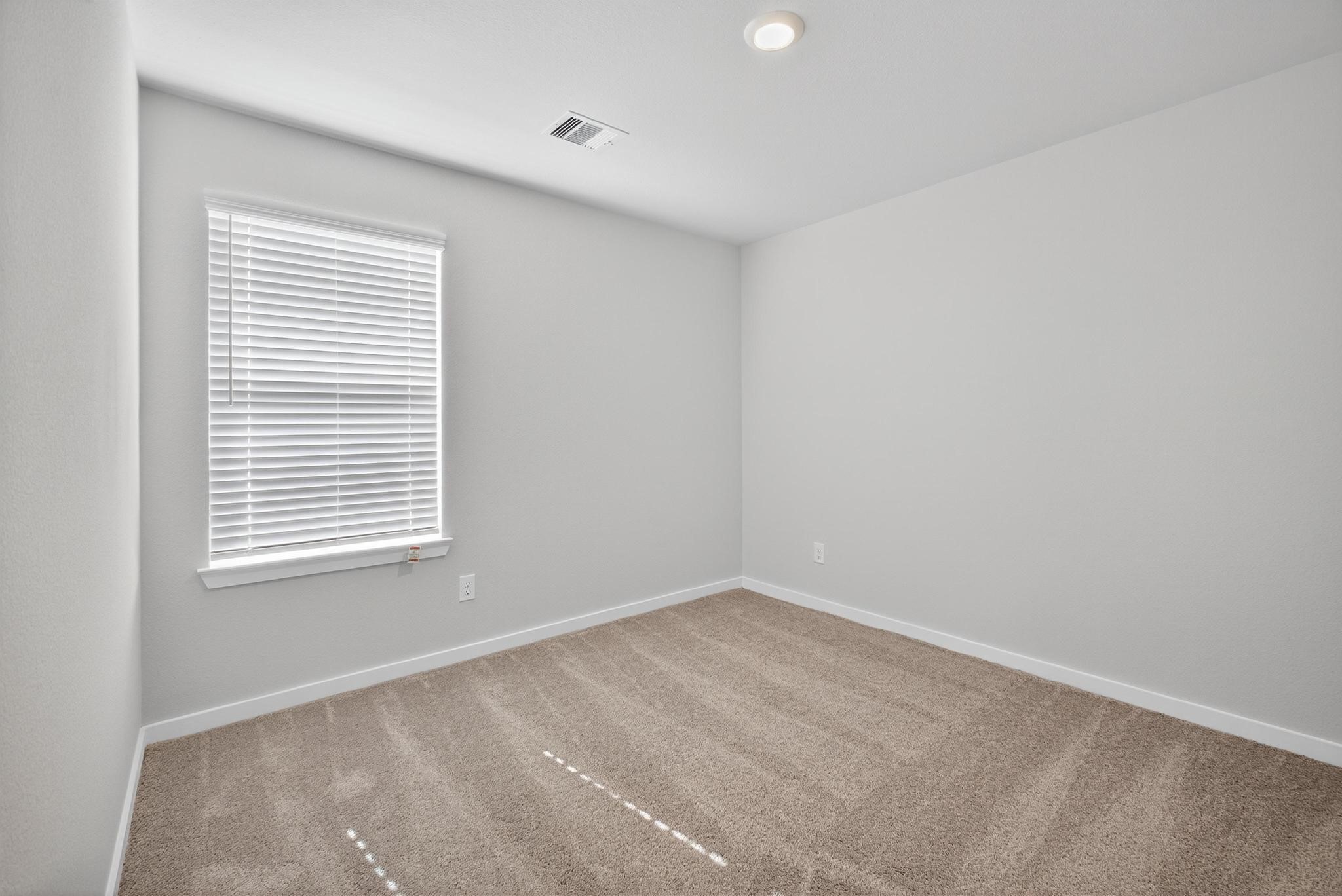 3922 Accolade Crossing Brookshire, TX 77423 - Photo 14 of 27 an empty room with a window