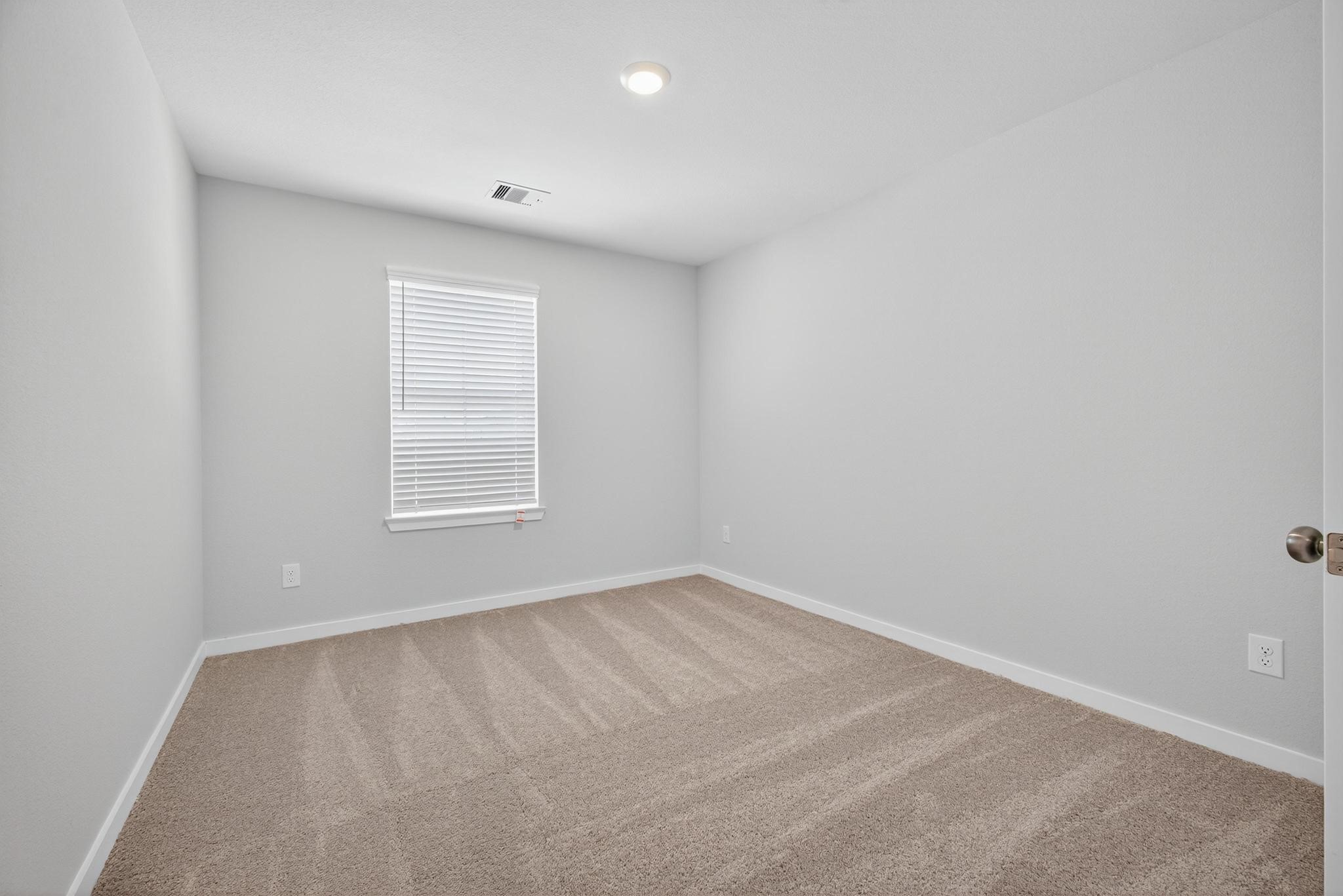 3922 Accolade Crossing Brookshire, TX 77423 - Photo 16 of 27 an empty room with a window
