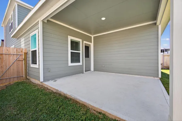 a view of an empty room with a garage