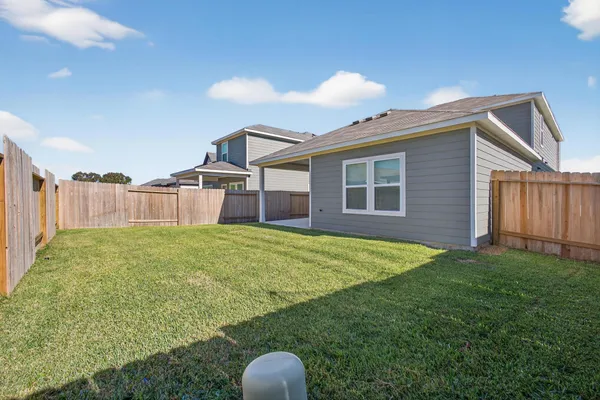 a house view with a garden space